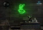 Astronaut with Balloon on Solar Neon Sign Green