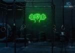 Dumble in Hand Neon Sign Green