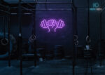 Dumble in Hand Neon Sign Purple